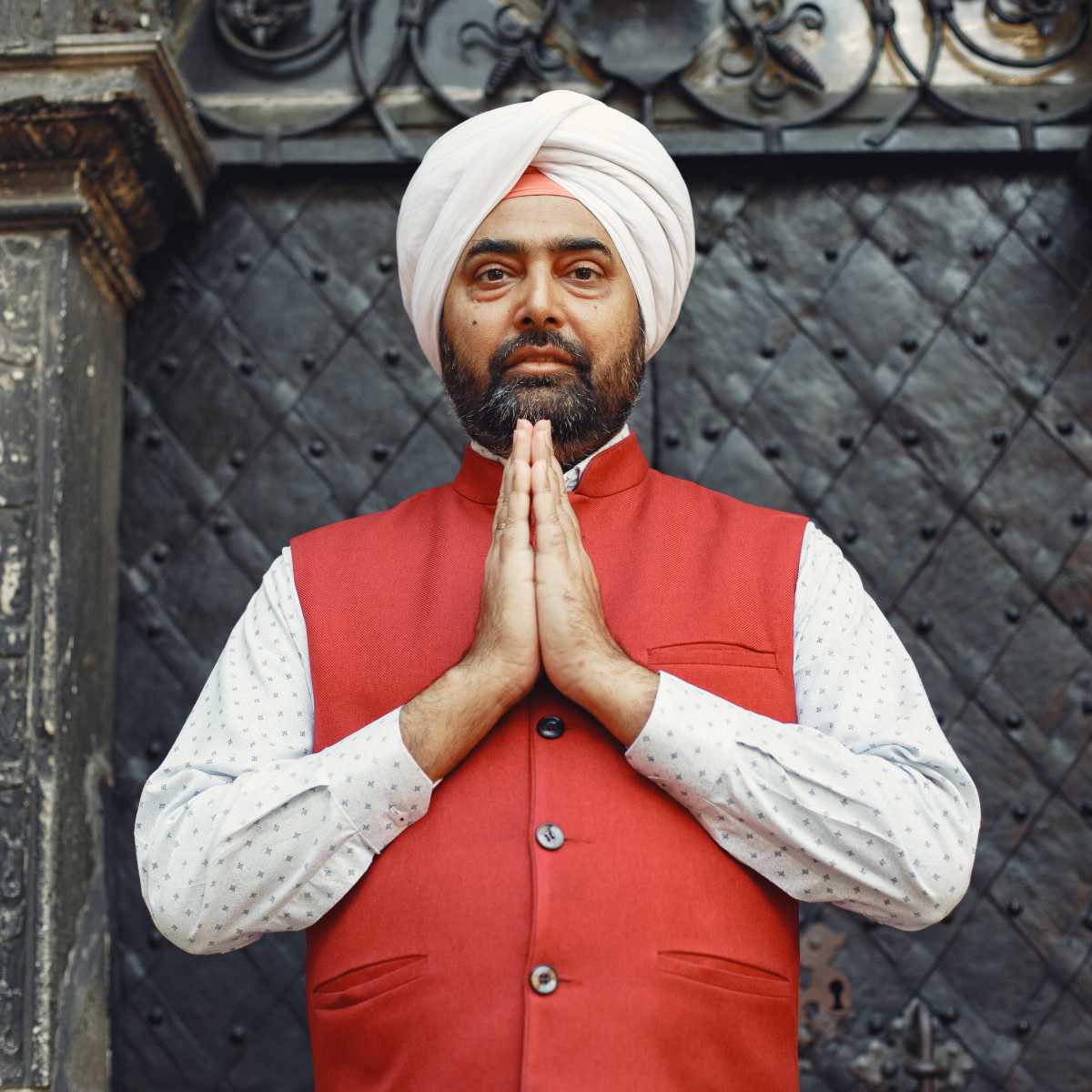  Indian man in a city. Male in a traditional turban. Hinduist in a summer city. 