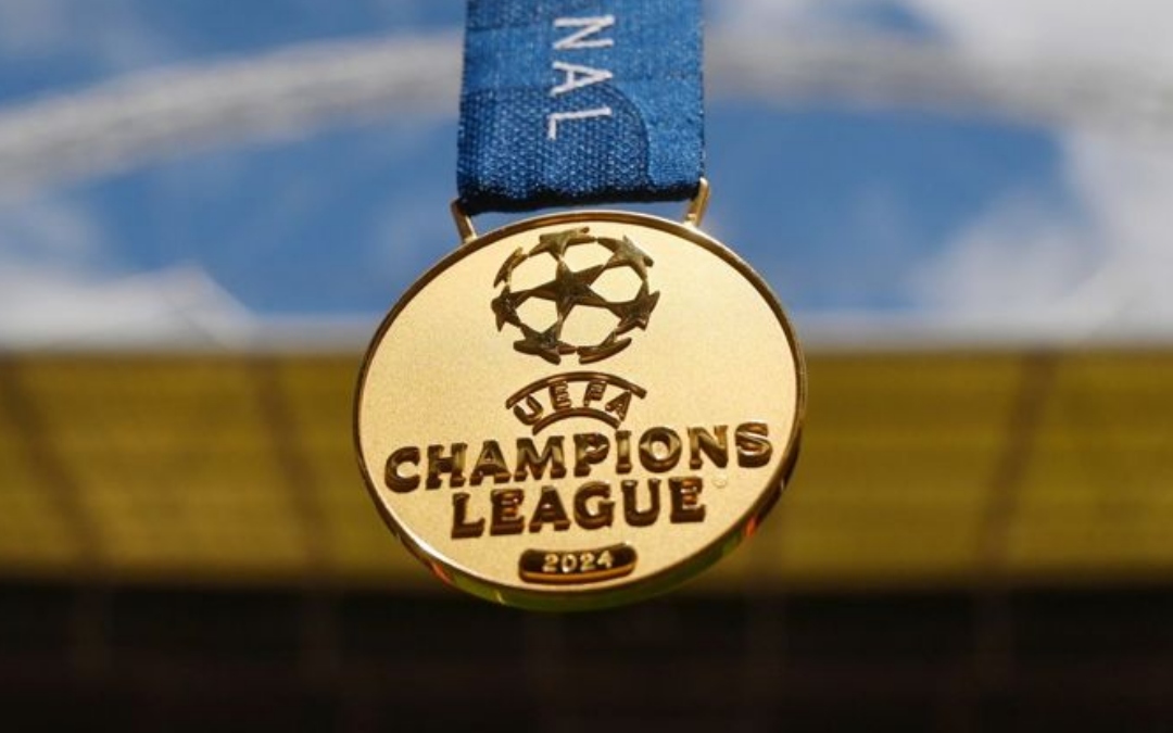 Medalha de campeão da Champions.