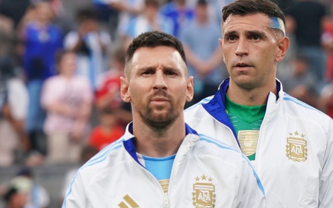 Lionel Messi e Emiliano Martínez